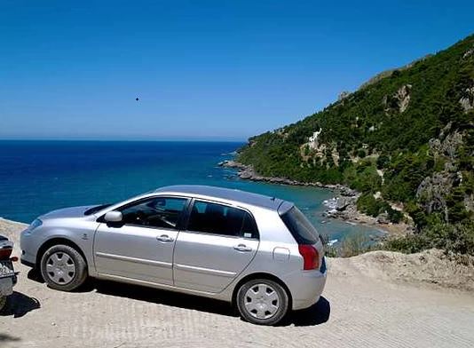 Car parked in sunny country