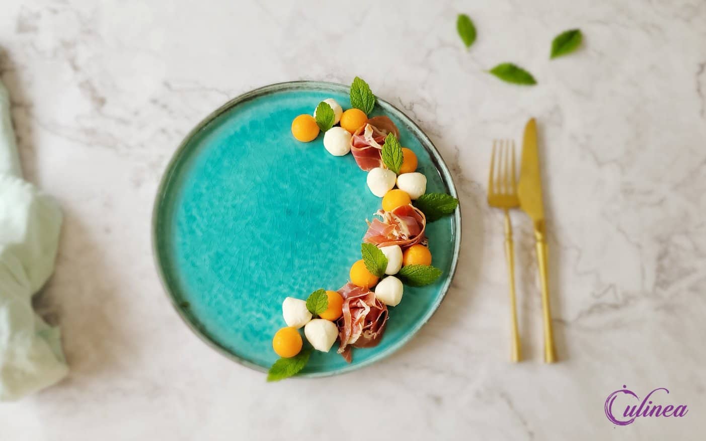 Meloen met ham en mozzarella