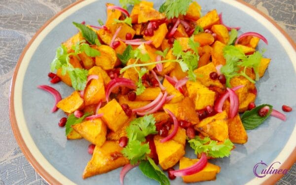 Warme pompoensalade met granaatappelpitjes