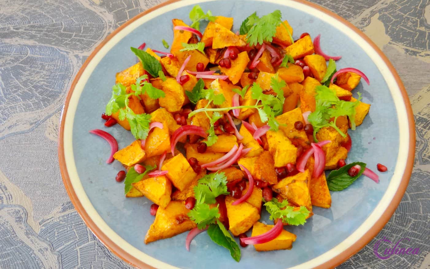 Warme pompoensalade met granaatappelpitjes