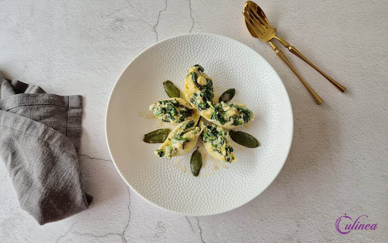 Pastaschelpen met spinazie en pompoen