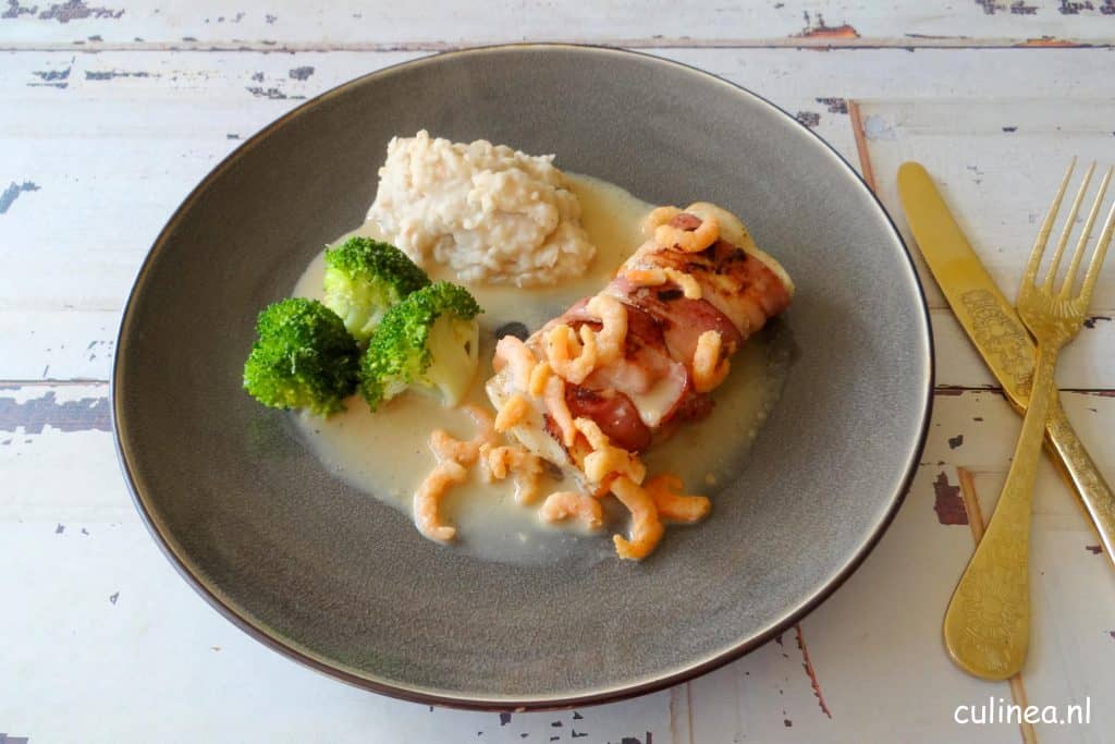 Kabeljauw omwikkeld met pancetta en garnaaltjes