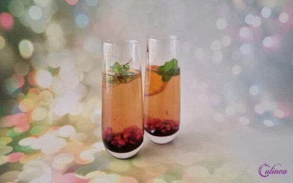 Champagnecocktail met granaatappel