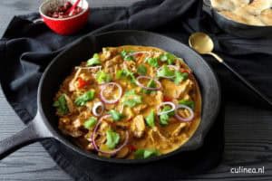 Curry van kalkoen en wokgroenten