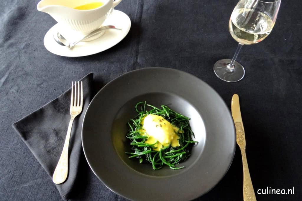 Vis quenelles met beurre blanc, spinazie en zeekraal