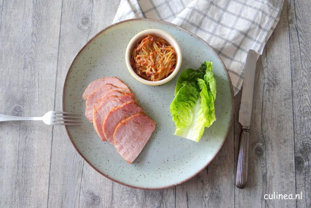 Aardappelpotjes uit de oven met spek en kaas
