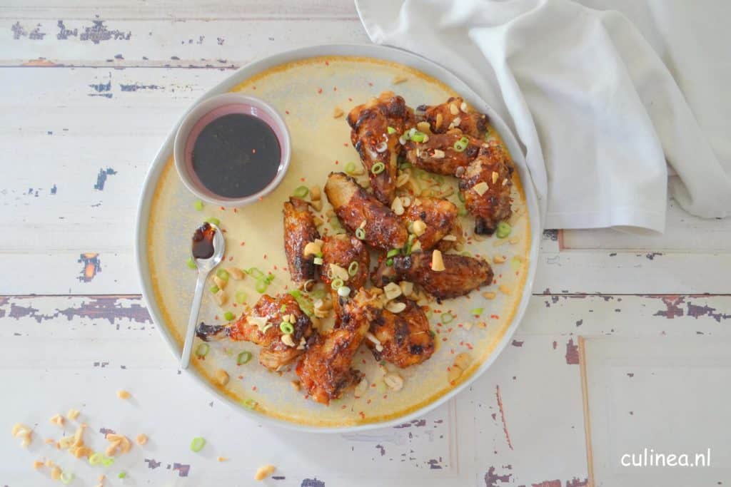 Pittige kippenvleugels met cashewnoten