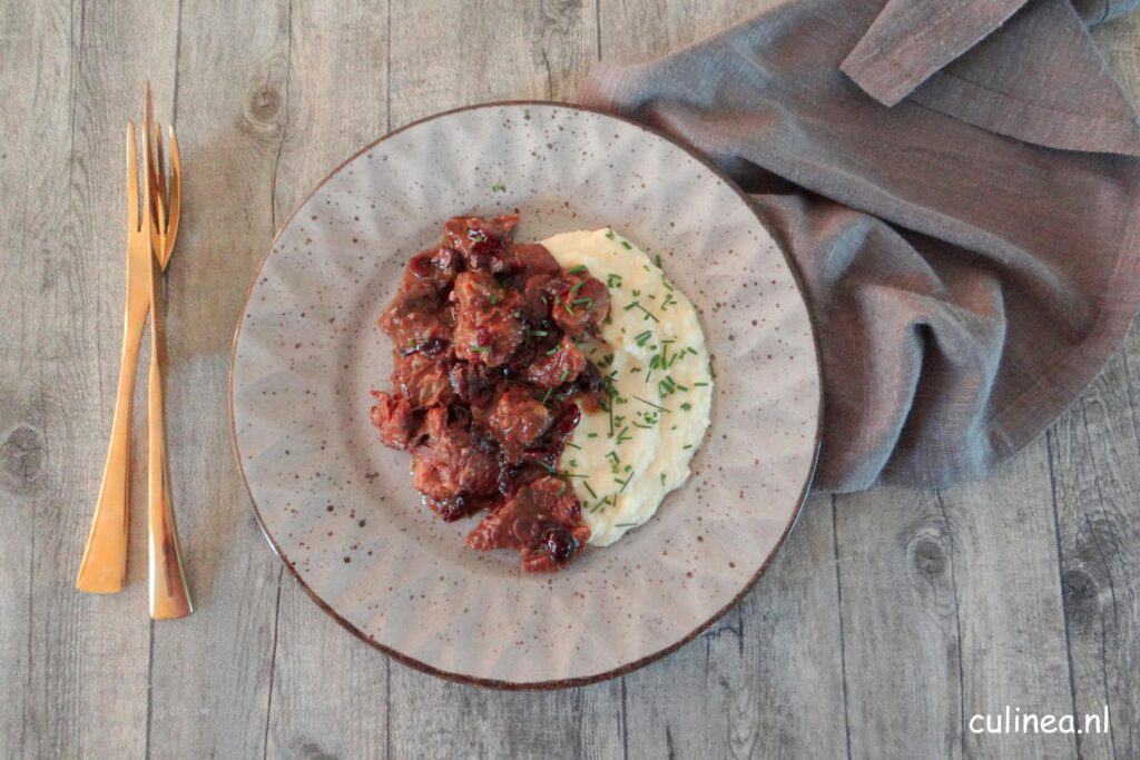 Kruidige runderstoof met cranberries