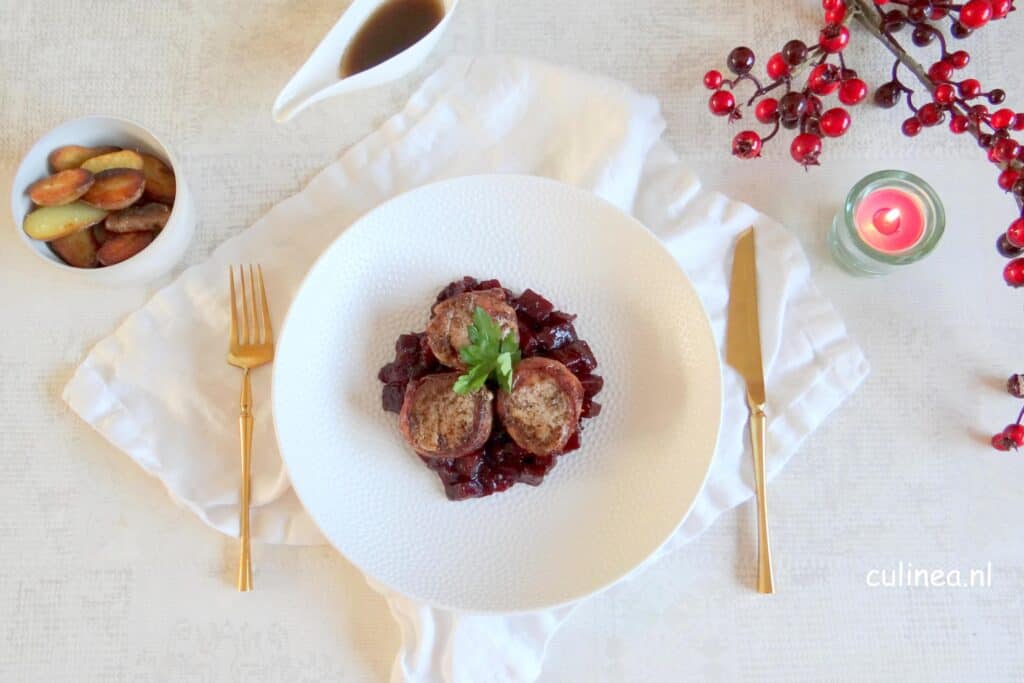 Varkensmedaillons met cranberrybietcompote