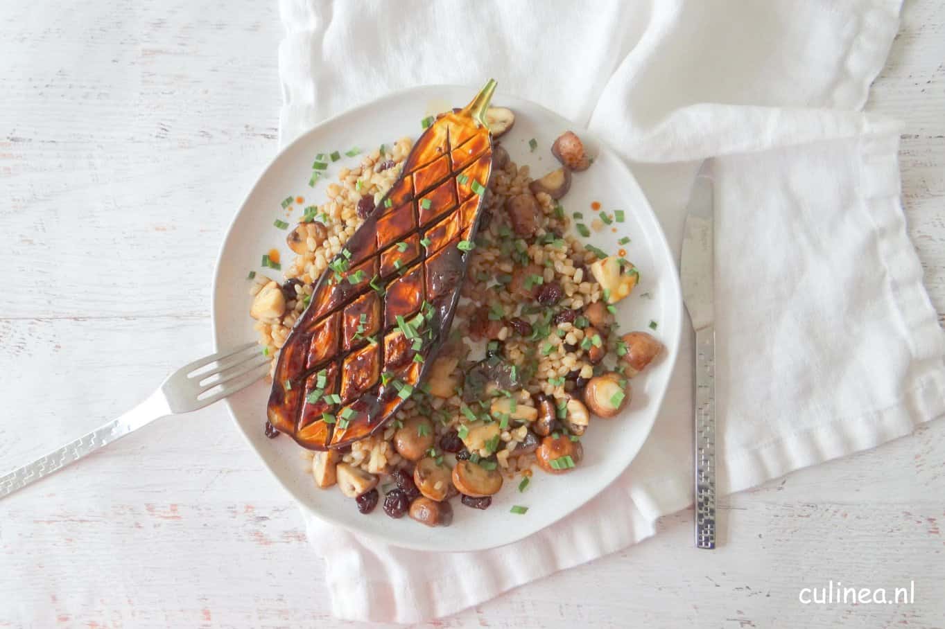 Aubergine met paddenstoelen en tarwe