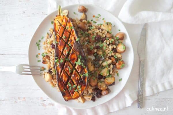 Aubergine met paddenstoelen en tarwe