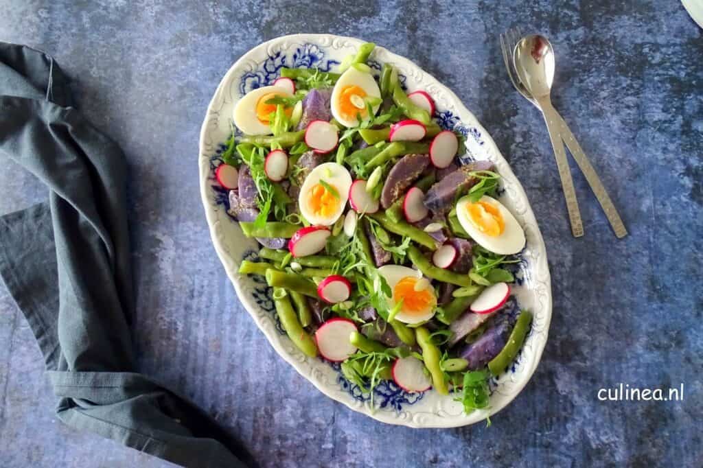 Salade met truffelaardappel en bonen