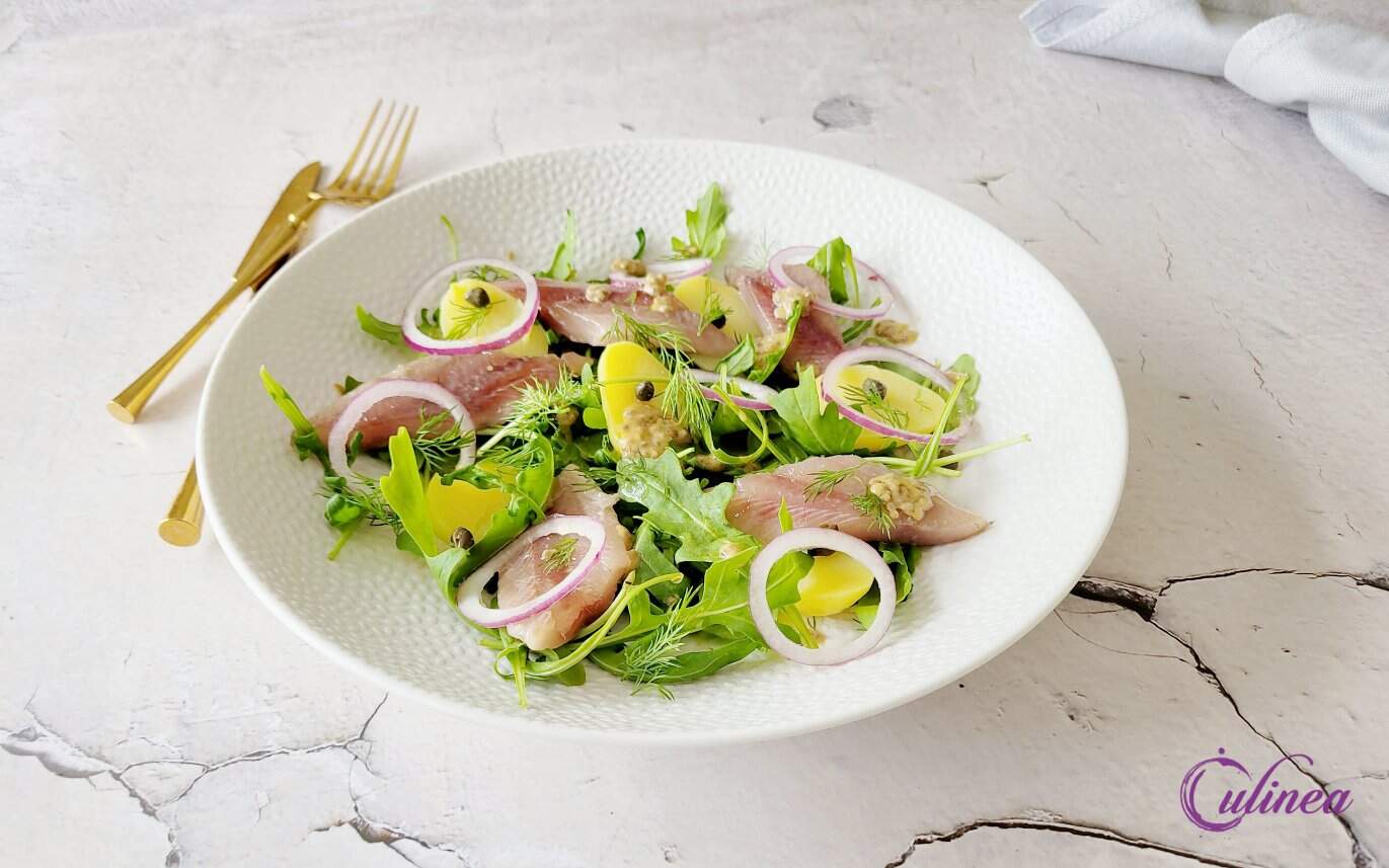 Haringsalade met aardappel en rucola