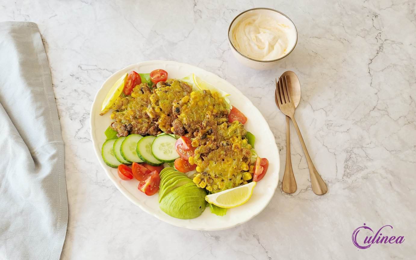 Mossel fritters met maïs en prei