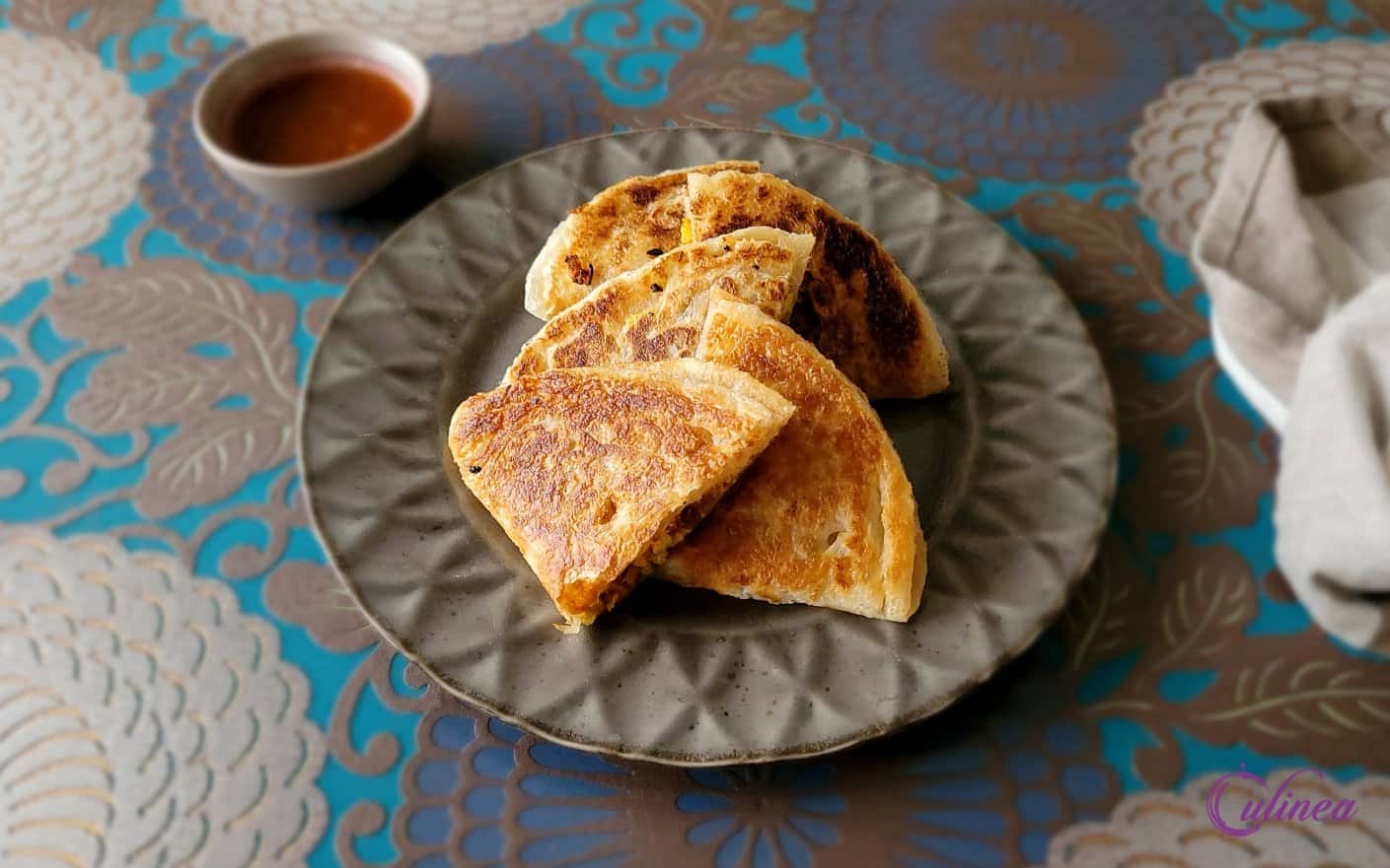 Paratha gevuld met kip curry