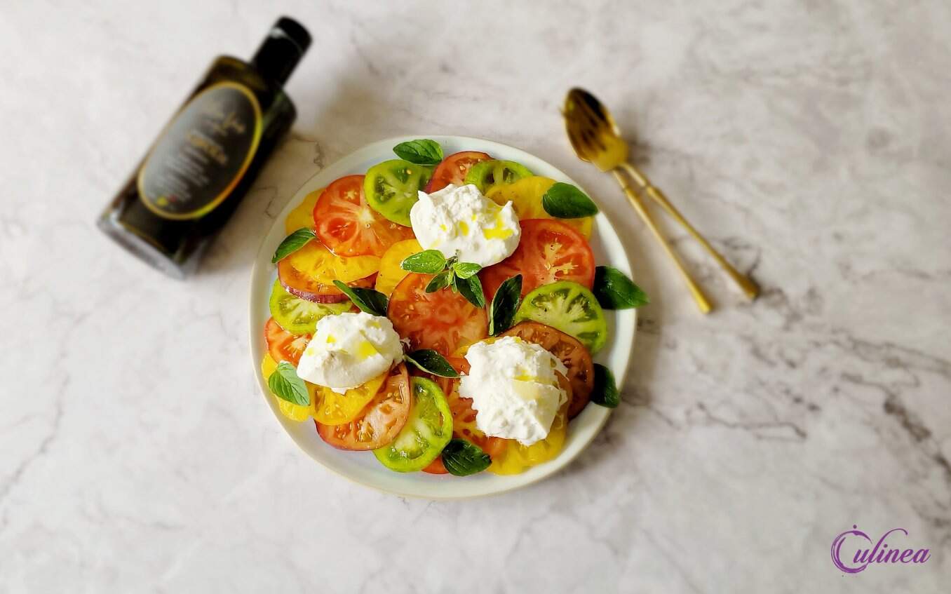 Gekleurde tomaten burrata salade